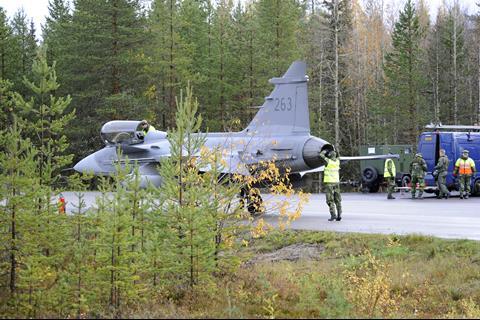 Saab Gripen being inspected by mobile maintenance crew c Royal Swedish Air Force